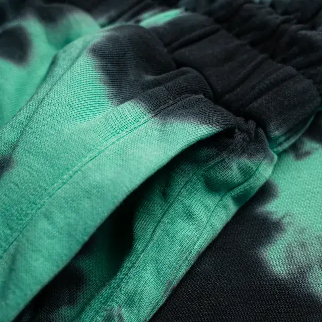 Green-Black-pocket-tie-dye-shorts-qikink.webp