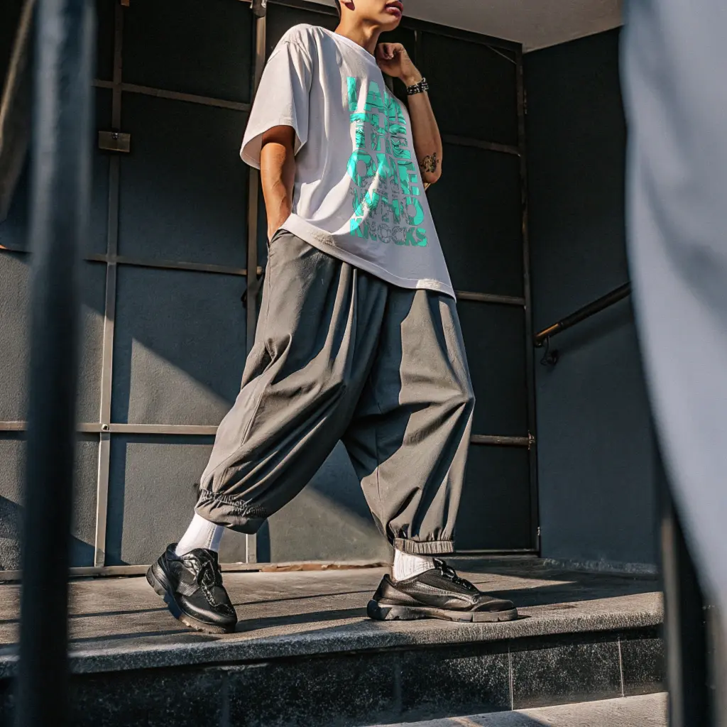 a-young-man-wearing-plain-white-over-sized-tshirt- (1).webp